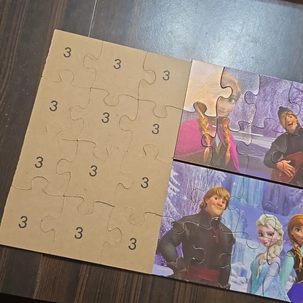 5 Disney Frozen Puzzles in Wooden Storage Bin